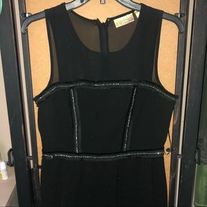 Black dress with gorgeous detailing.